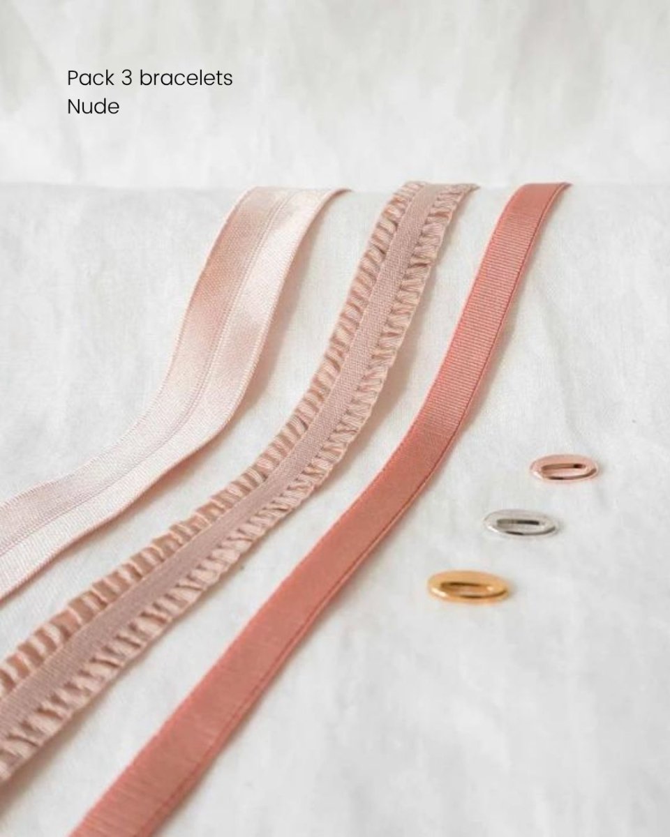 Pack nude 3 bracelets Mon Petit Poids composé du ruban irisé nude, du ruban froufrou rose poudré et du ruban stretch blush. 